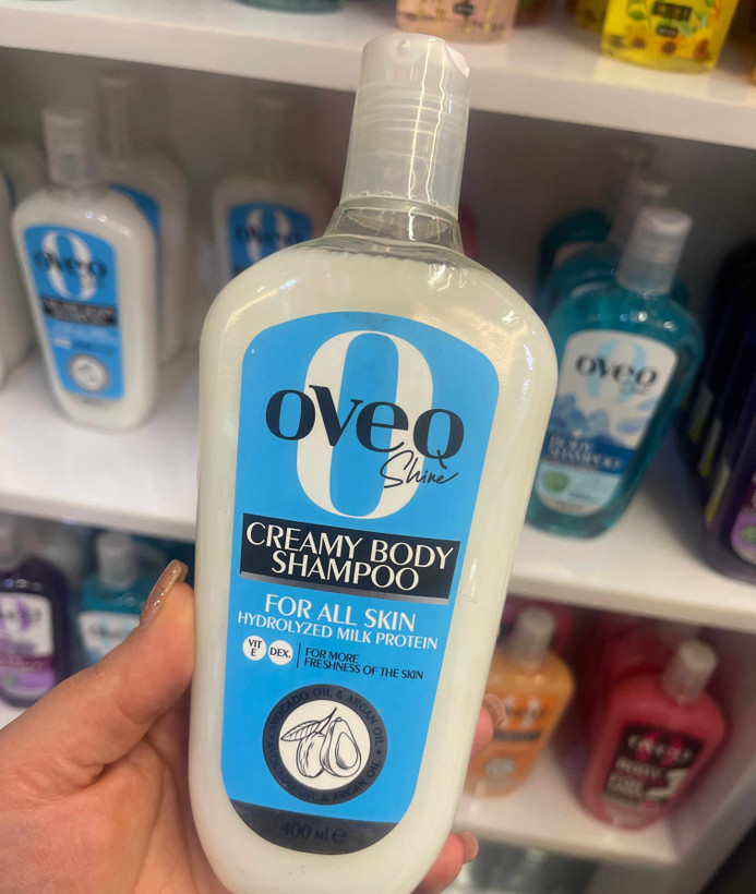 شامپو بدن کرمی اُوِک شاین (Oveq Shine) مناسب انواع پوست حاوی پروتئین شیر، روغن آرگان و آووکادو حجم ۴۰۰ میلیلیتر